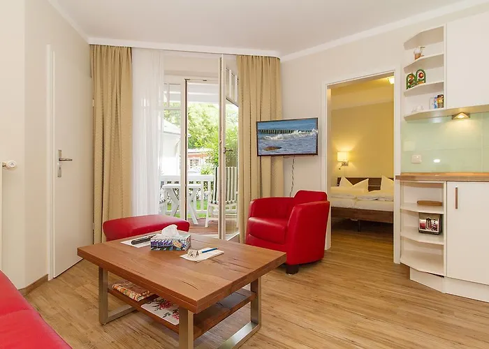 Апартаменты Am - Strandvilla Belvedere Кюлунгсборн