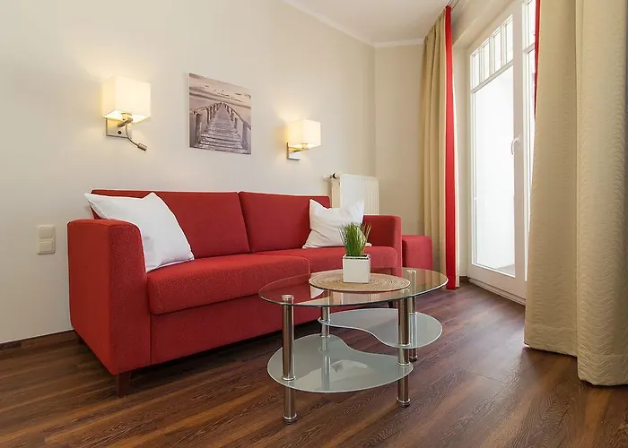 Апартаменты Am - Strandvilla Belvedere Кюлунгсборн